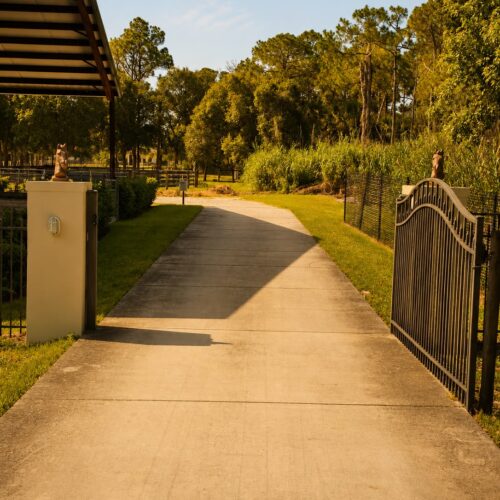 Open gates at Darly Oaks Equestrian for horse boarding near Palm City, FL.